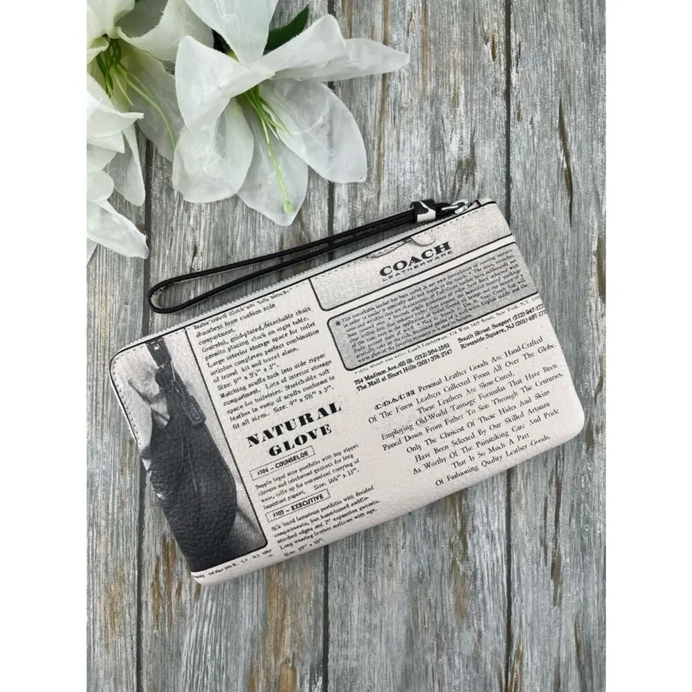 Coach Large Corner Zip Wristlet With Newspaper Print Pebbled Leather Bag